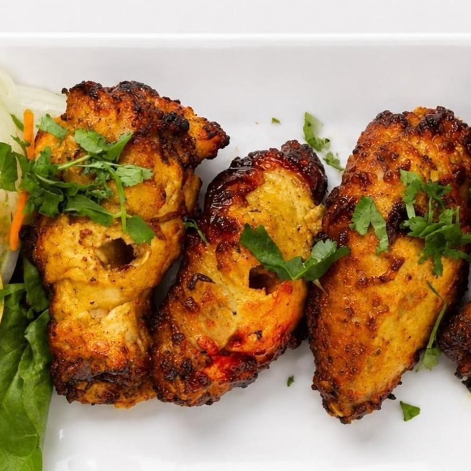 Grilled fish with lemon and cilantro.